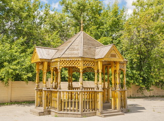 Carved wooden gazebo in the city park