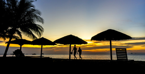 Fototapeta na wymiar Gazebo and people silhouette with sunset background