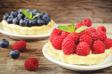 tartlets with raspberries and blueberries