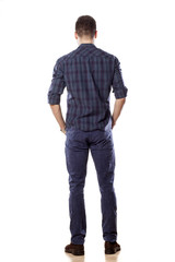 rear view of a young man in jeans
