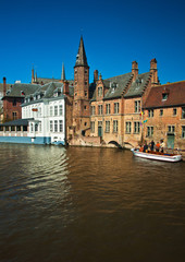 Naklejka na ściany i meble Houses along the canals of Brugge or Bruges, Belgium