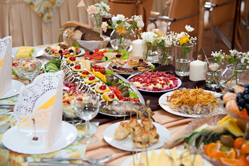 Festive well-laid table with food and drink