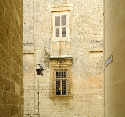 Windows of an old house in Mdina, Malta