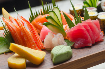 A colorful platter of sashimi sushi