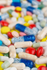 Color pills and capsules background