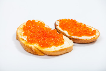 Obraz na płótnie Canvas Sandwiches with salmon red caviar 
