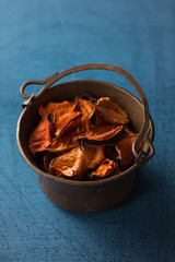 Aromatic, dried orange potpourri leaves