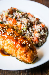 Baked salmon with couscous and vegetables