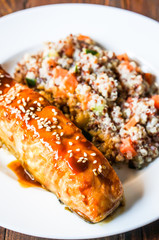 Baked salmon with couscous and vegetables