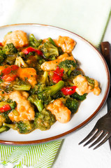 Chicken breasts in soy sauce and stir-fry vegetables