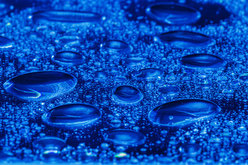 Panele Szklane Podświetlane  blue water drops on the surface