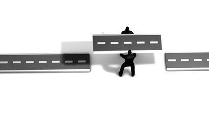 Two workers put a new slice of road joining two existing roads