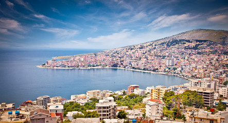 Panoramic view on Sarande city, Albania. - obrazy, fototapety, plakaty