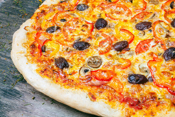Delicious italian pizza served on wooden table
