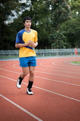 Fototapeta premium Asian athlete on the track
