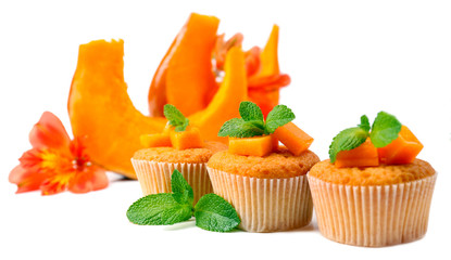 Tasty pumpkin muffins, isolated on white