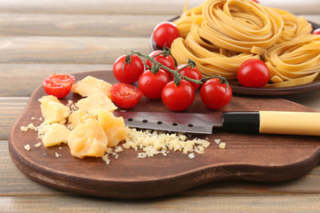 Still life with raw homemade pasta and ingredients for pasta