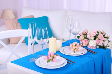 Festive table setting in interior