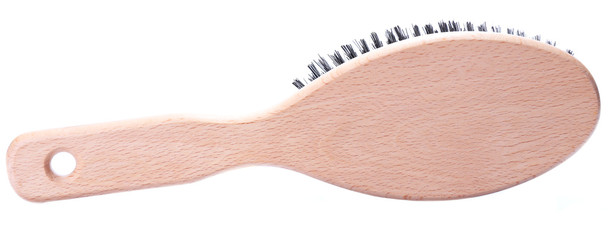 Wooden hairbrush isolated on white