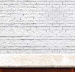 Empty marble table and white brick wall in background. product d