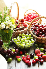 Fresh berries in wicker baskets, close up