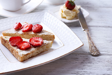 Fresh toast with  homemade butter and fresh strawberry