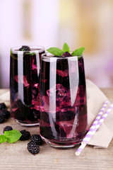 Tasty cool blackberry lemonade with ice