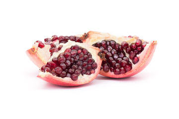 Ripe pomegranate fruit isolated on white background cutout