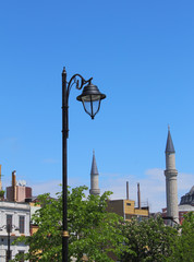 lantern on a background of blue sky and greenery