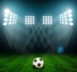 Soccer ball on the field of stadium with light