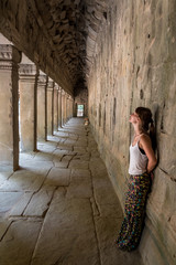 Beautiful Girl posing at Angkor Wat, Cambodia. Traveling Asia.