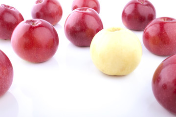 Red apples and the yellow one