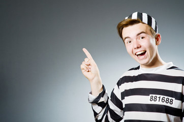 Funny prison inmate in concept