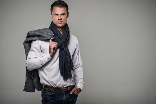 Handsome Young Man In Casual Jacket And Neck Scarf