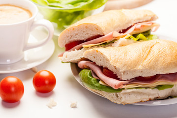 Panini sandwich with ham, cheese and tomato