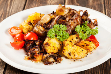 Fried pork chop with mushrooms and chips