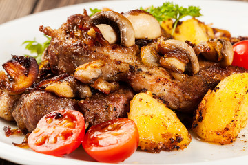 Fried pork chop with mushrooms and chips