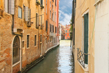 Fototapeta na wymiar House on a narrow canal in Venice, Italy