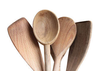 Wooden cooking utensils on white background 

