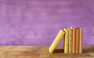 row of books, grungy background, free copy space