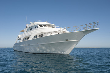 Fototapeta na wymiar Private motor yacht at sea