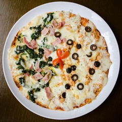 Homemade Pizza,half salmon and half Spinach.