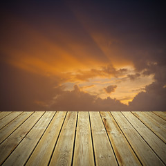 Fototapeta na wymiar Wooden deck floor and sunbeams