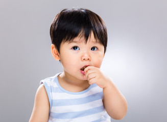 Baby boy eat finger food