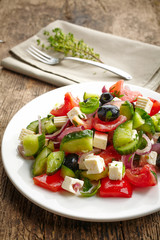 fresh vegetable salad with cheese and olives
