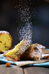 Tasty cake on table on dark background