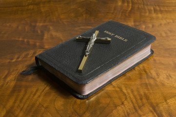 Cross on Bible