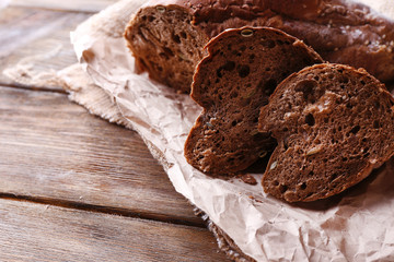 Fresh bread on wooden background