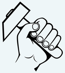 Hand holding hammer
