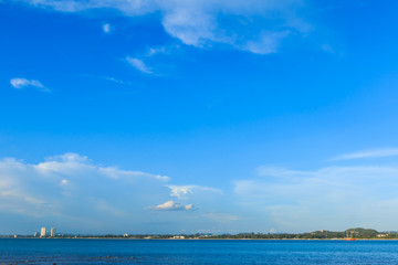 Beautiful sea under cloudy blue sky